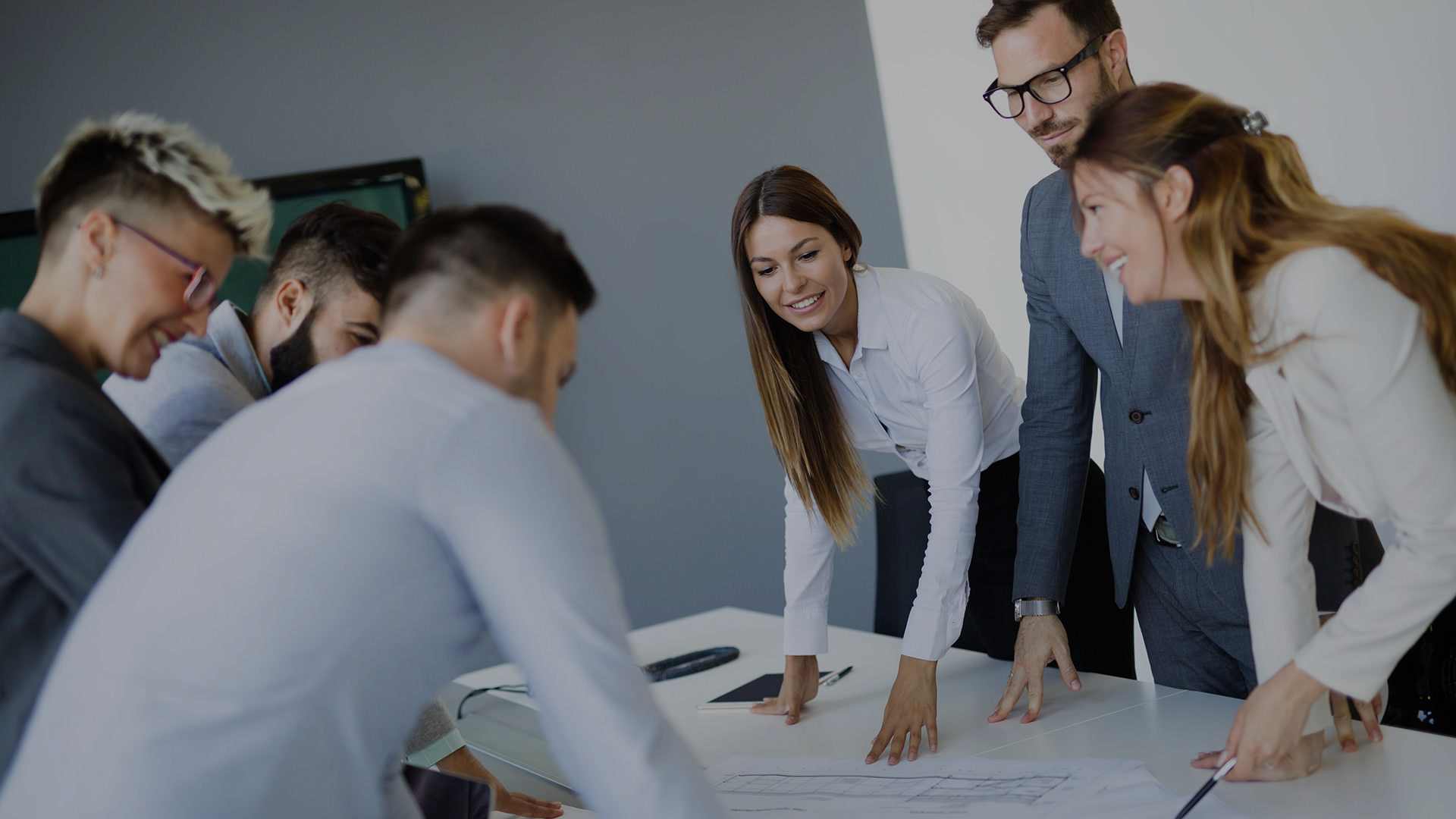 Professionals collaborating around a table